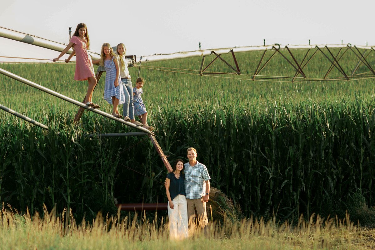 The Freitag family in their popcorn field in Byron, Nebraska